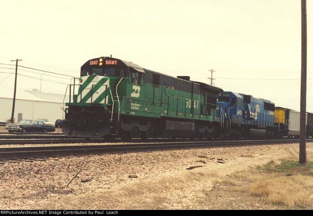 Loaded coal train rolls east